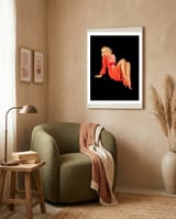 Smiling Pinup Woman Posing In Red Dress framed in a tender room thumbnail