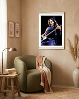 Geddy Lee framed in a tender room thumbnail