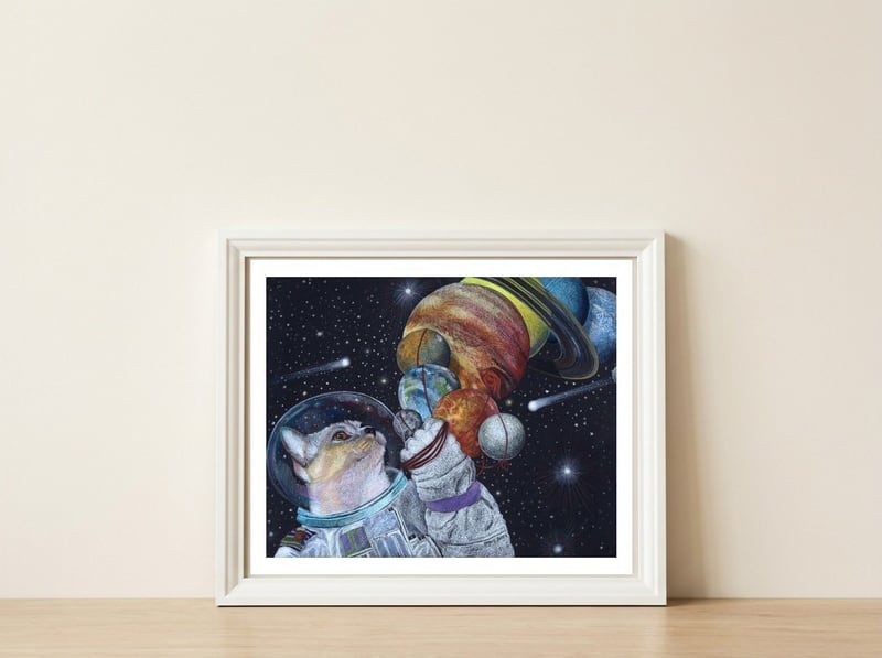 Space Cat — framed, leaning against the wall