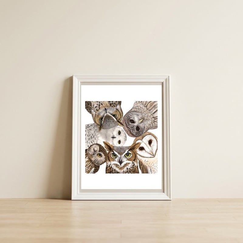 Owls — framed, leaning against the wall