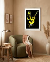 Mick Ronson American Guitarist Legend framed in a tender room thumbnail