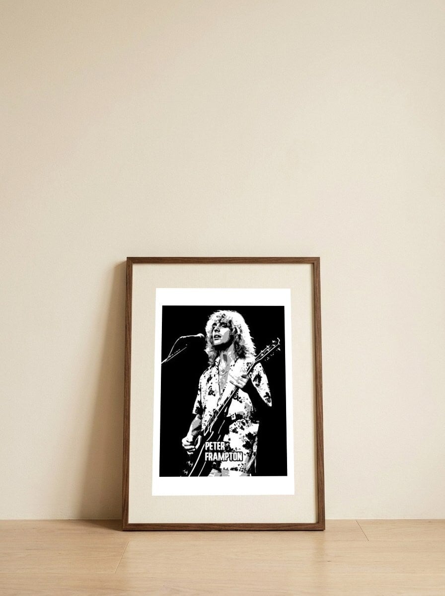 peter-frampton-music-legend — framed, leaning against the wall