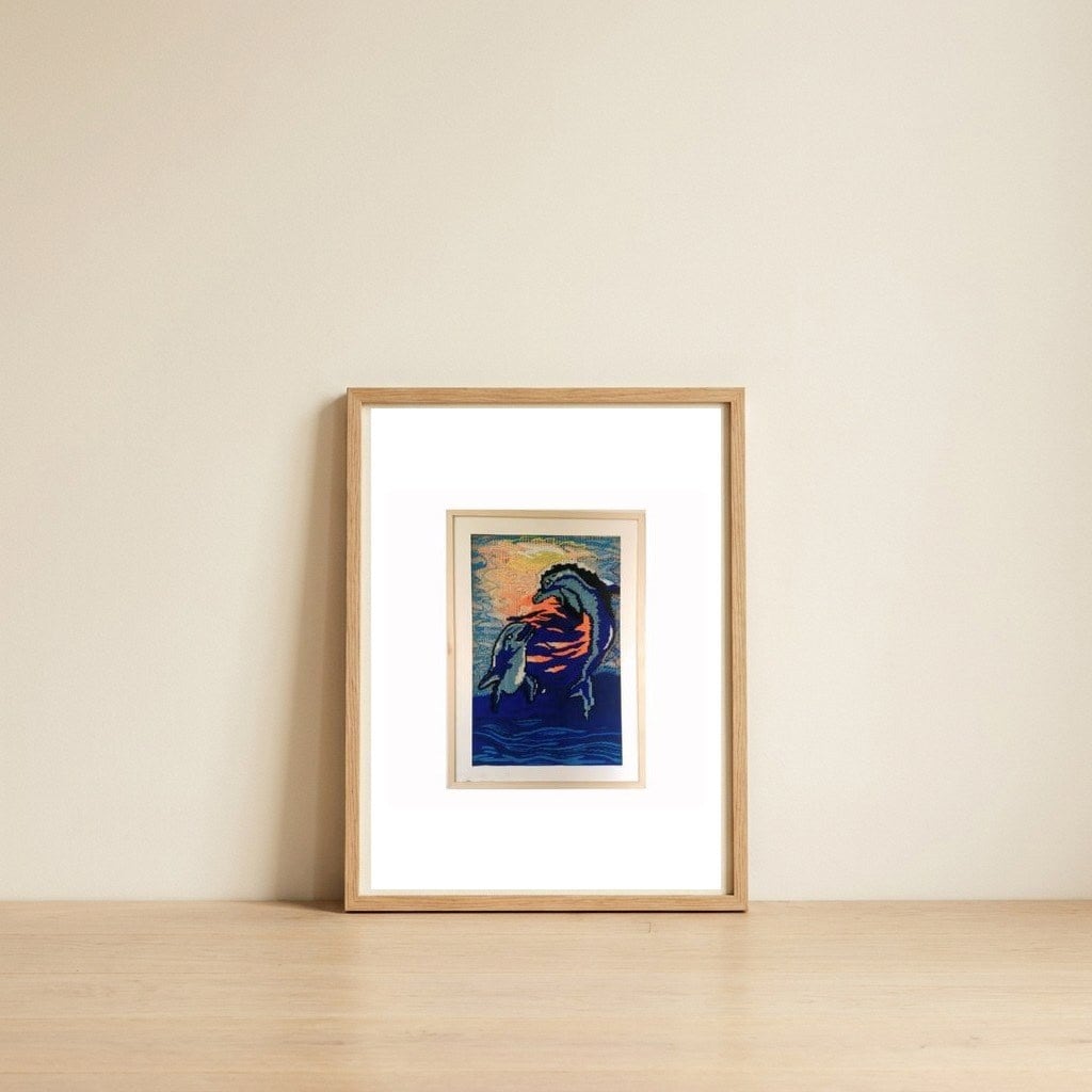1750357373888 — framed, leaning against the wall
