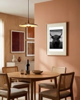 highland-cow-black-and-white framed in a intimate room thumbnail