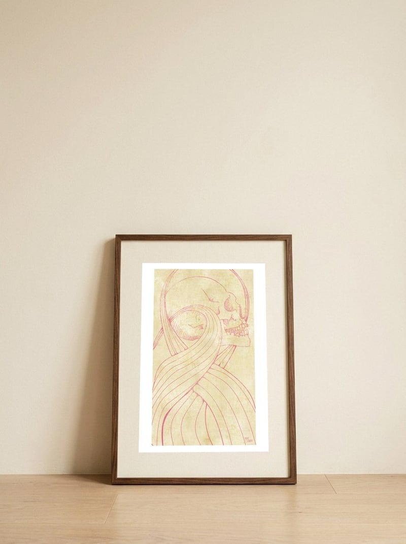 Skull — framed, leaning against the wall