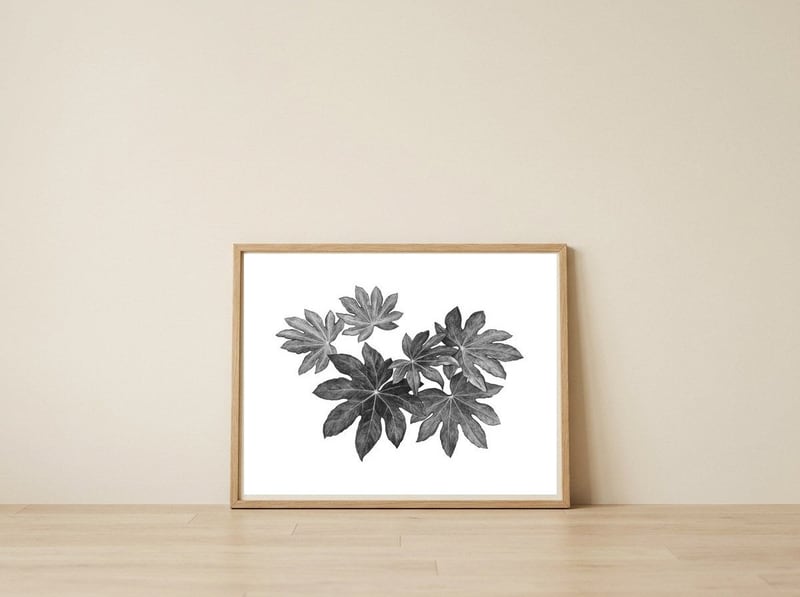 Leaves — framed, leaning against the wall