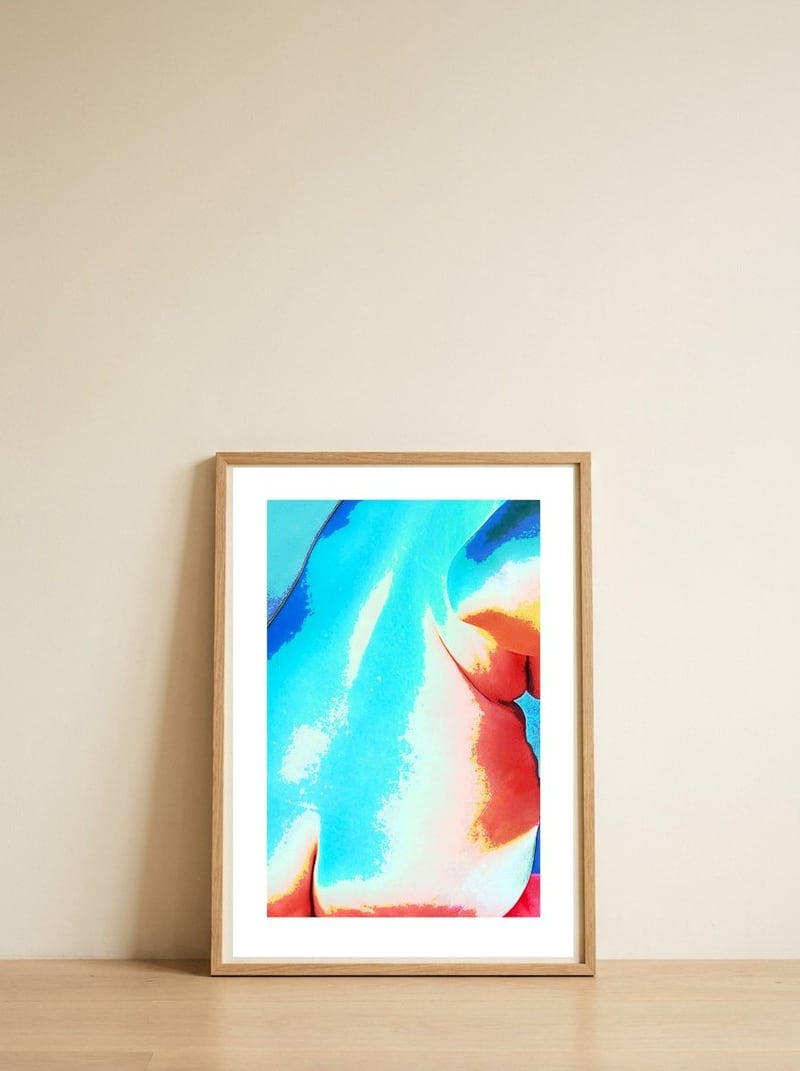 aqua-fire-rising-tide — framed, leaning against the wall