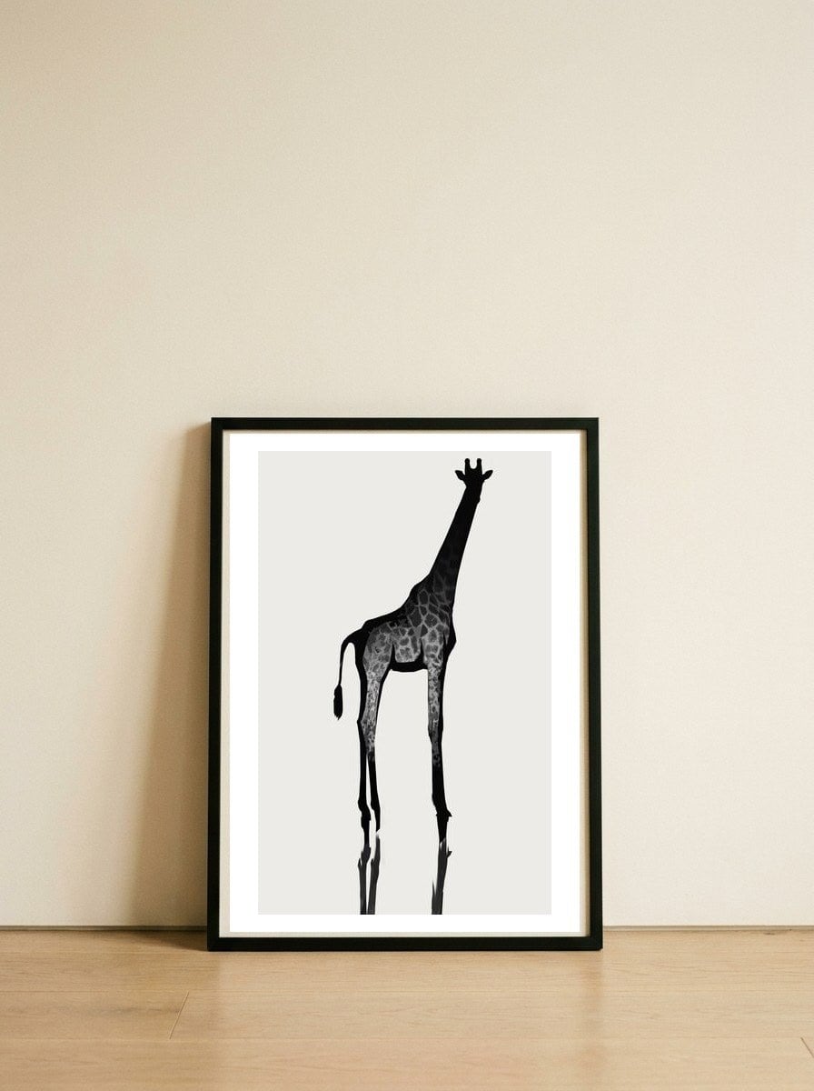 Giraffe — framed, leaning against the wall