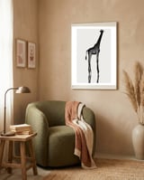 Giraffe  framed in a tender room thumbnail