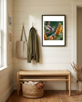 hummingbird-feeding-on-yellow-flowers-nectar-1 framed in a relaxed room thumbnail