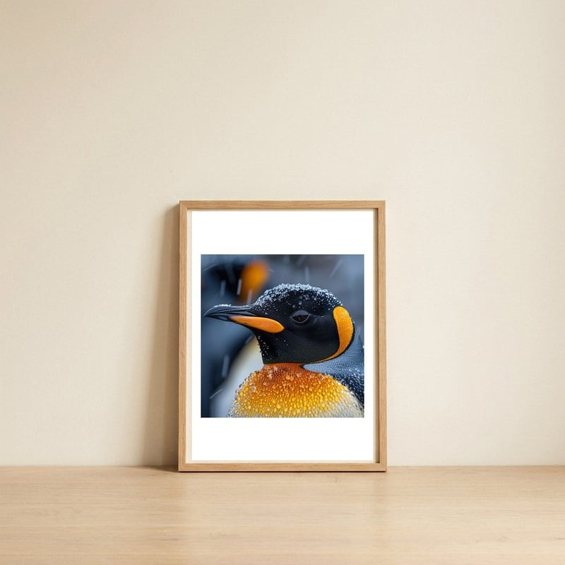 king-penguin-close-up-in-snowfall-1 — framed, leaning against the wall