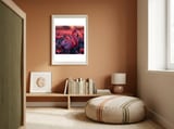 Pink Flamingo Bird Standing Among Flowers At Sunset framed in a gentle room thumbnail