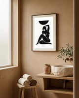 Matisse Inspired Black Nude Woman Art, Minimalist Abstract Female Figure, Modern Silhouette Artwork framed in a serene room thumbnail
