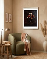 An Astronaut in Space framed in a tender room thumbnail