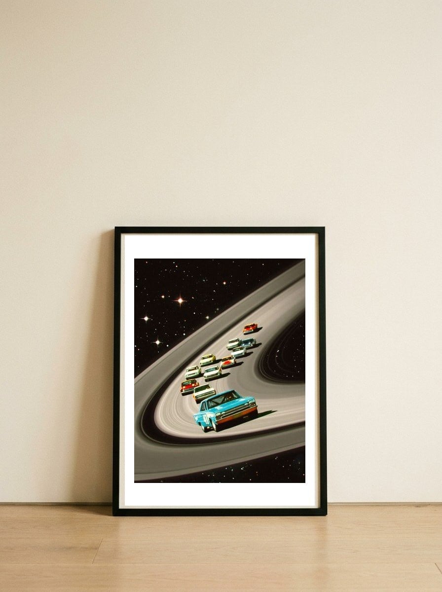 Saturn Grand Prix — framed, leaning against the wall