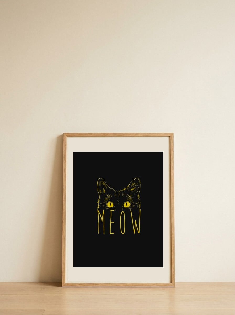 Meow — framed, leaning against the wall