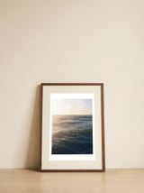 Golden Hour Ocean Waves — framed, leaning against the wall thumbnail