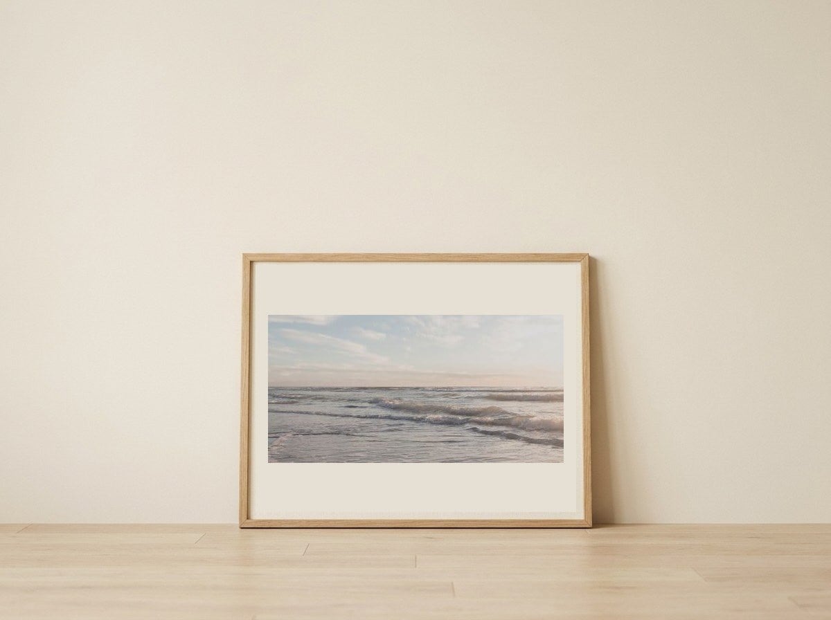 Gentle Ocean Waves — framed, leaning against the wall