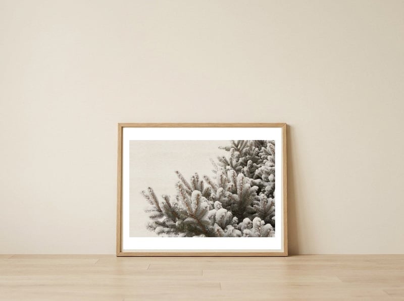 Snowy Pine Branches — framed, leaning against the wall