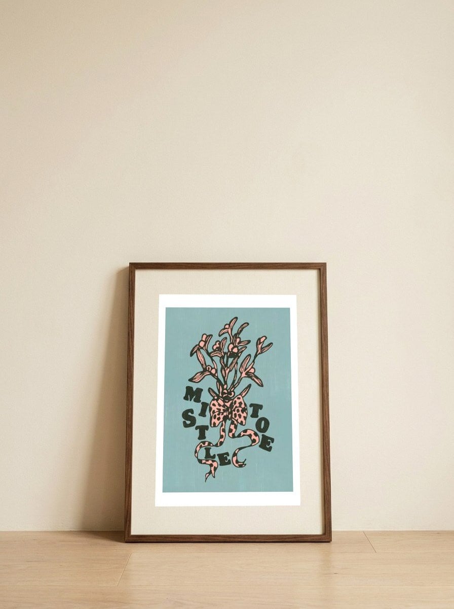 Mistletoe Holiday Bow — framed, leaning against the wall