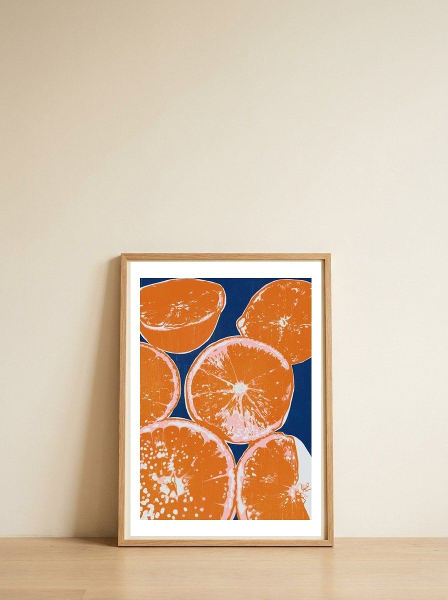 Vibrant Orange Slices — framed, leaning against the wall