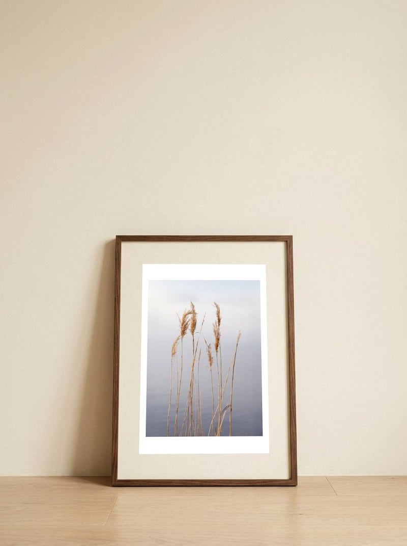 Serene Reeds and Water — framed, leaning against the wall