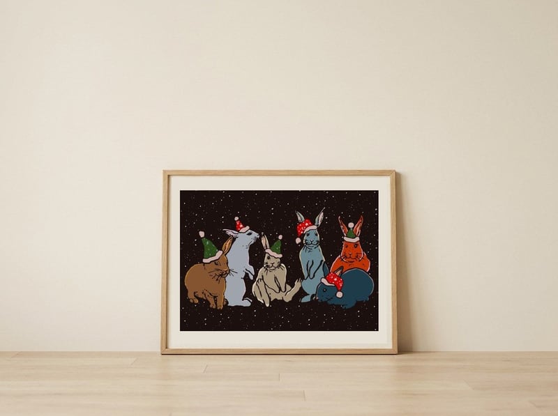 Festive Holiday Bunnies — framed, leaning against the wall