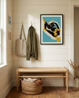 Playful Calico Cat framed in a relaxed room thumbnail