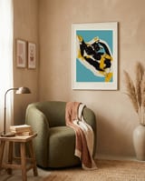 Playful Calico Cat framed in a tender room thumbnail