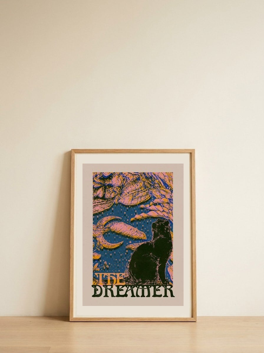 Black Cat Dreamer — framed, leaning against the wall