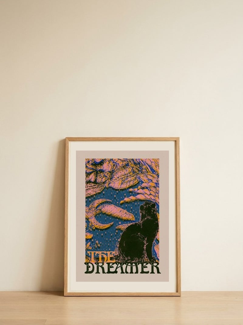 Black Cat Dreamer — framed, leaning against the wall