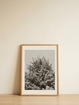 Snowy Evergreen Tree — framed, leaning against the wall thumbnail