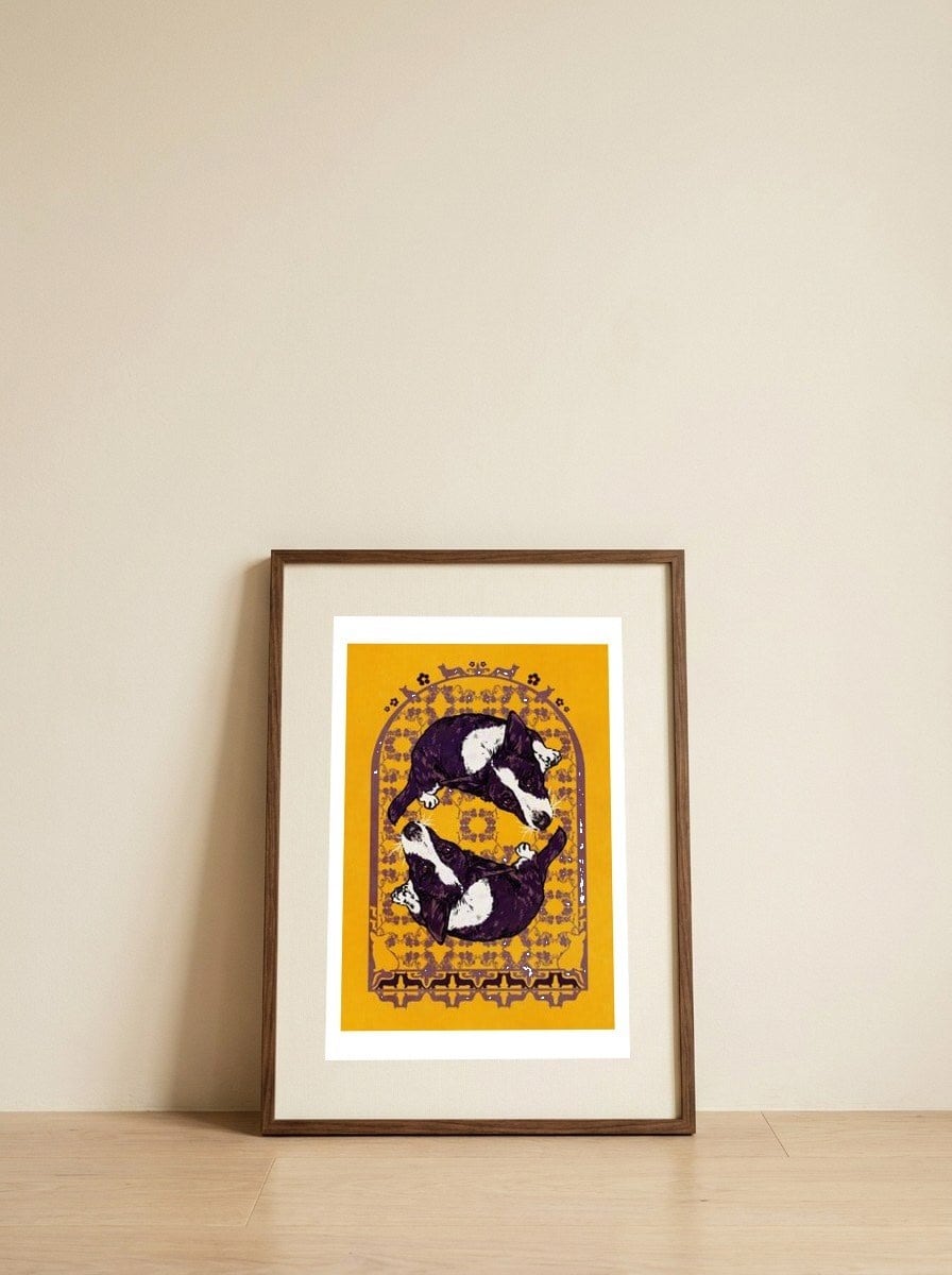 Playful Purple Corgis — framed, leaning against the wall