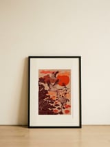Flying Cranes Tropical Sunset — framed, leaning against the wall thumbnail