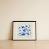 Three Blue Fish — framed, leaning against the wall thumbnail