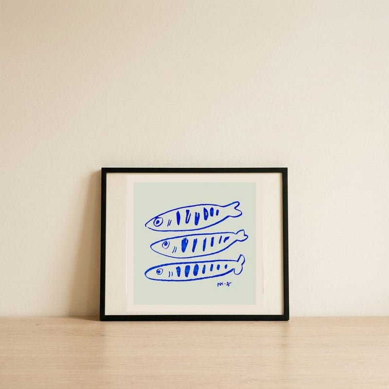 Three Blue Fish — framed, leaning against the wall