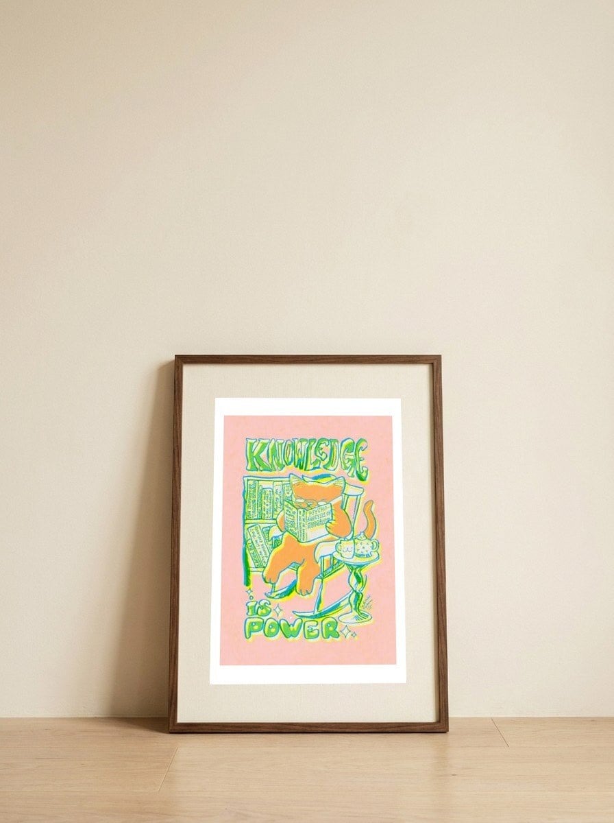 Cozy Reading Cat — framed, leaning against the wall