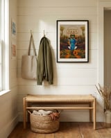 Her Asymmetries framed in a relaxed room thumbnail
