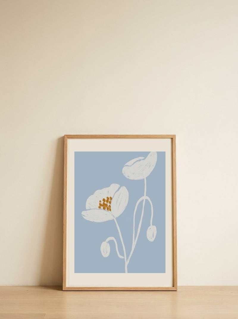 White Flowers Blue Background — framed, leaning against the wall