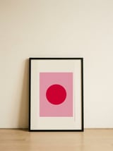 Red Circle on Pink — framed, leaning against the wall thumbnail