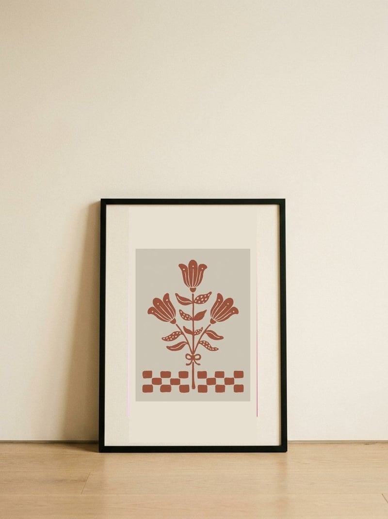 Terracotta Folk Flowers — framed, leaning against the wall