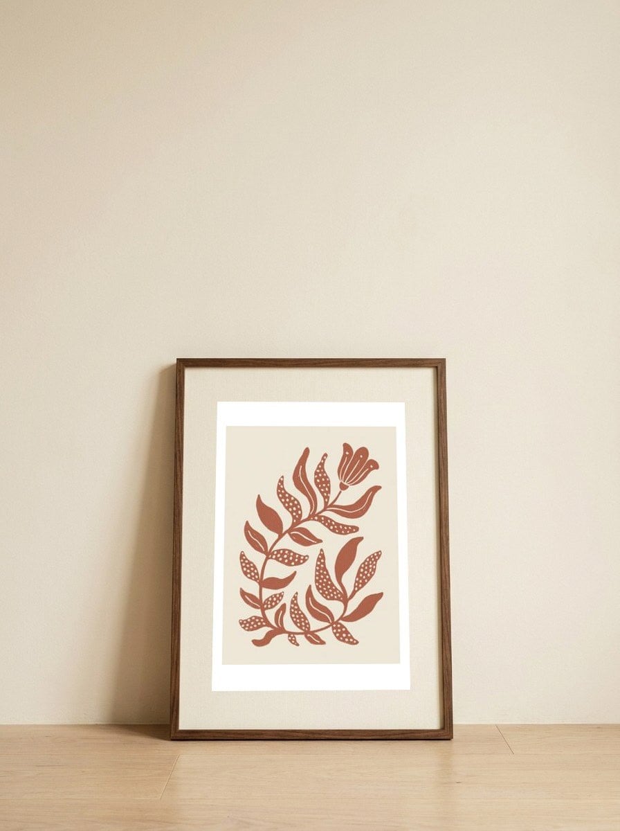 Terracotta Botanical Bloom — framed, leaning against the wall