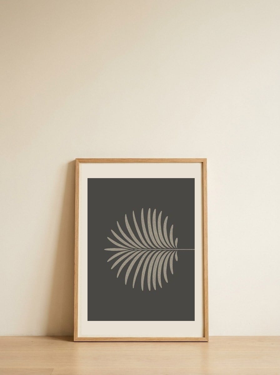 Minimalist Palm Frond — framed, leaning against the wall