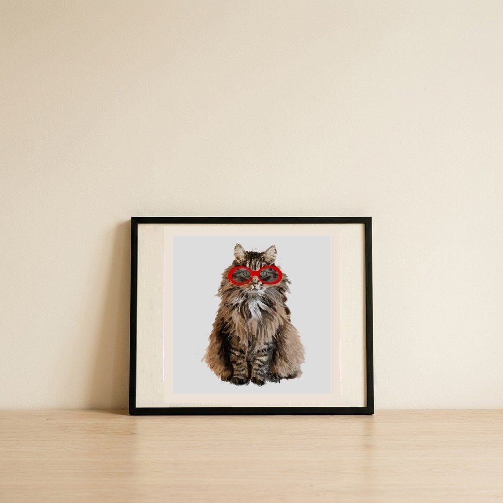 Tabby Cat Sunglasses — framed, leaning against the wall