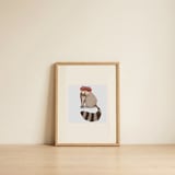Raccoon Red Sunglasses — framed, leaning against the wall thumbnail