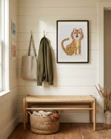 Cute Leopard Cub framed in a relaxed room thumbnail