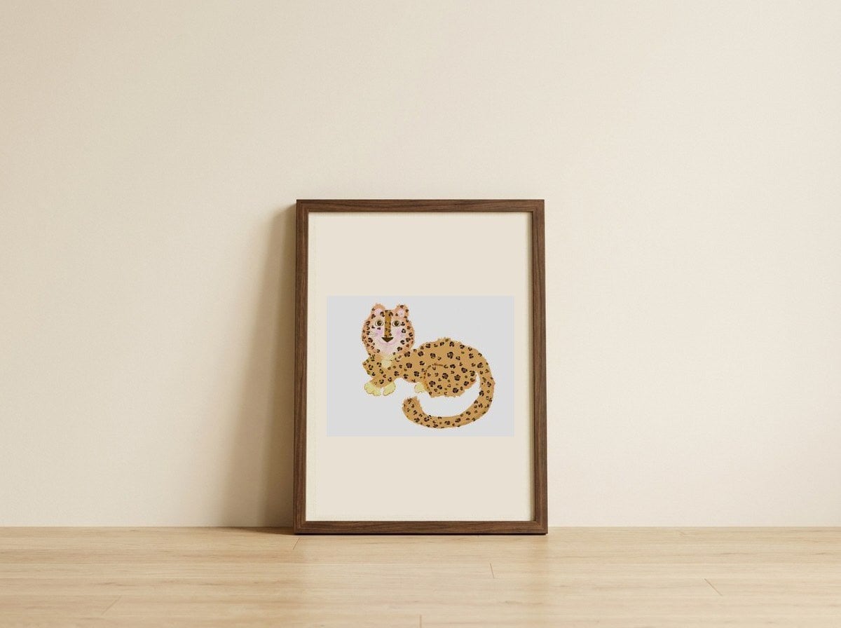 Adorable Leopard Cub — framed, leaning against the wall