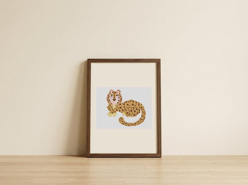 Adorable Leopard Cub — framed, leaning against the wall