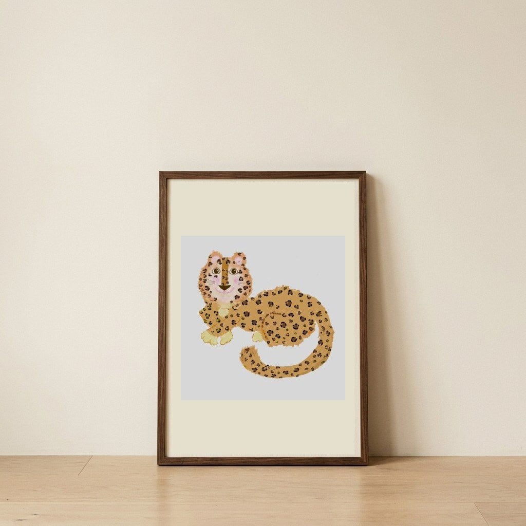 **Cute Spotted Leopard** — framed, leaning against the wall