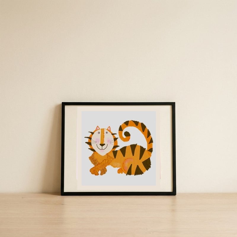 Friendly Orange Tiger — framed, leaning against the wall